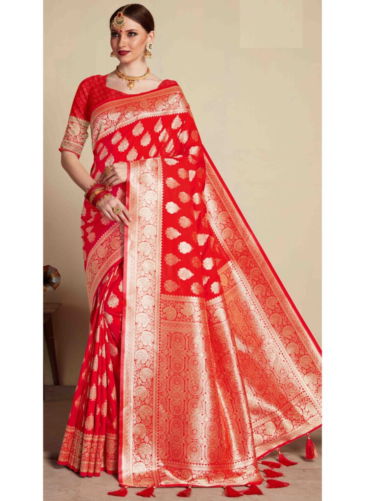 A traditional Banarasi saree featuring vibrant red check patterns, complemented by an intricate gold Zari border, exuding timeless elegance and sophistication.