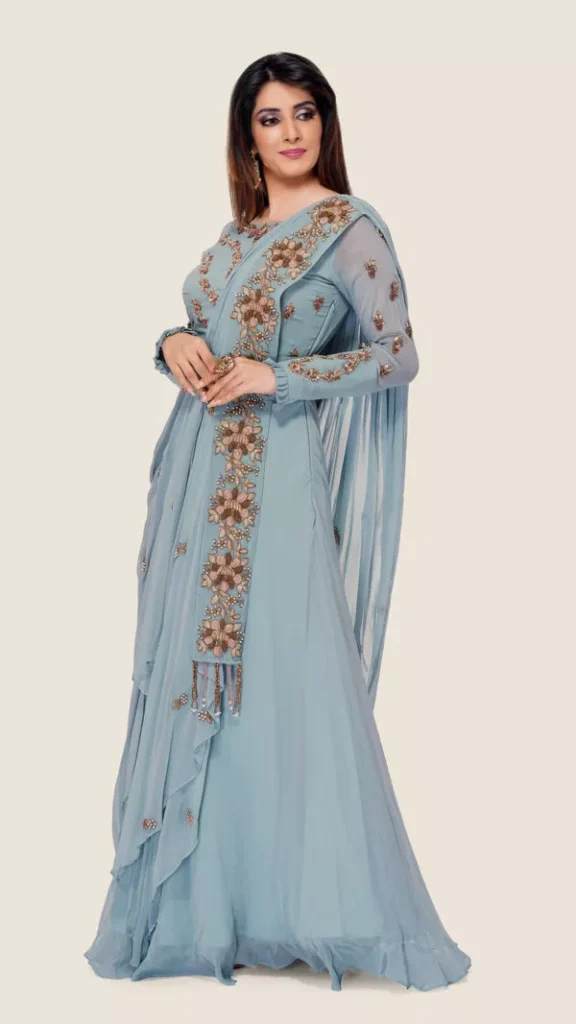 A beautiful Mogra flared gown featuring stylish embroidered sleeves, perfect for a chic and elegant look.