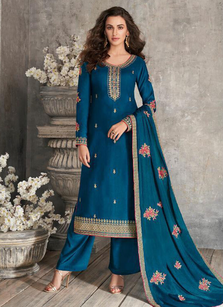 A chic blue semi-tussar salwar set featuring delicate texture, paired with a matching dupatta. 