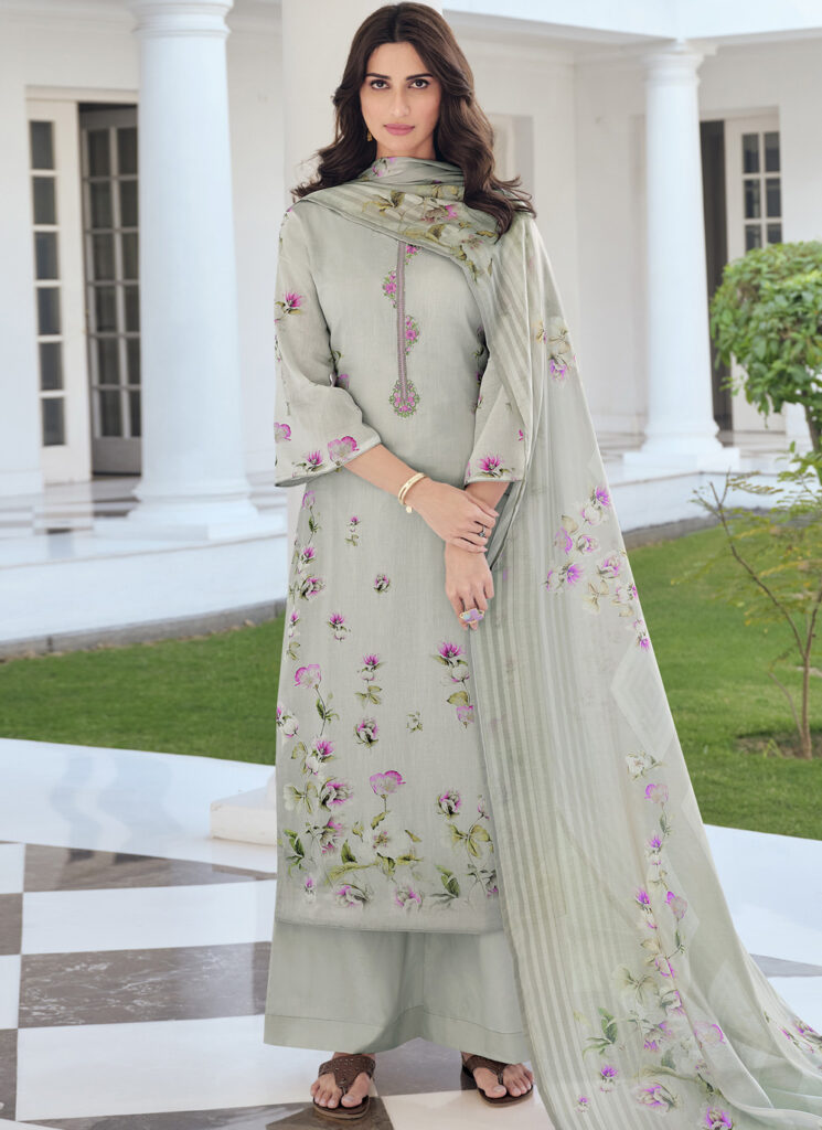 A stylish Pakistani salwar suit featuring intricate prints on blended cotton fabric, offering a perfect blend of comfort and elegance